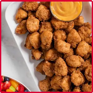 Chick-fil-A Chick-n-Strips Tray with crispy chicken strips and dipping sauces