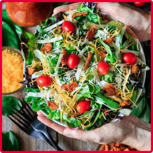 “Chick-fil-A Side Salad made with fresh mixed greens, shredded cheese, grape tomatoes and choice of signature dressing.”