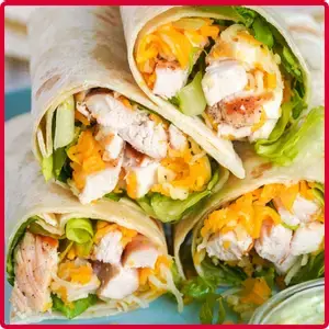 “Delicious chicken wraps filled with fresh ingredients and flavorful sauces.”